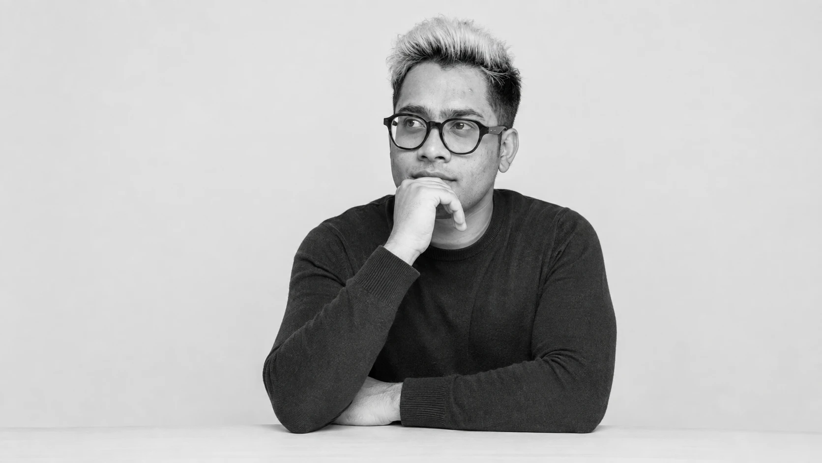AI-created editorial portrait of Sm Sharique at his desk